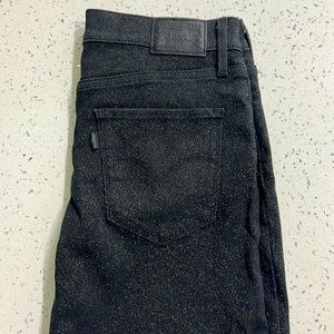 Black Glitter Levi’s skinny jeans